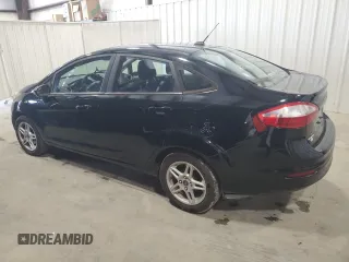 2019 Ford Fiesta SE z VIN 3FADP4BJ9KM151046, wystawiony jako Copart lot #56862255 z przebiegiem 77 002 mil mil oraz Tytuł czysty. Historia ofert i sprzedaży dostępna na DreamBid. Obrazek 2.
