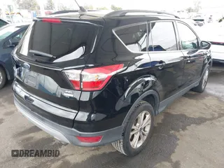 2018 Ford Escape SEL with VIN 1FMCU0HD6JUA86266, listed as a IAAI auction lot 42031613 with 72,798 mi miles and . Bid and sale history available at carsss.com. Image 4.