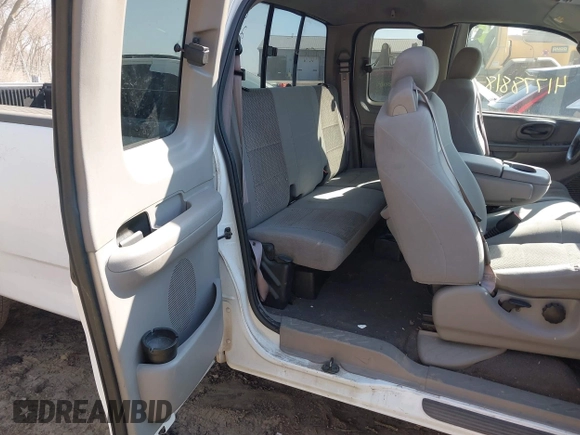 2003 Ford F-150 with VIN 2FTRX17L63CA31923, listed as a IAAI auction lot 41778818 with 107,600 mi miles and . Bid and sale history available at DreamBid. Image 8.