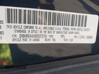 2009 Chrysler Town & Country Limited with VIN 2A8HR64XX9R597270, listed as a IAAI auction lot 41490394 with 126,186 mi miles. Bid and sale history available at carsss.com. Image 9.