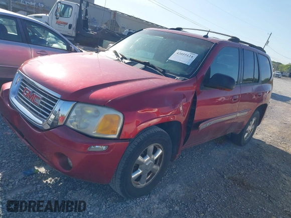 2004 GMC Envoy SLT with VIN 1GKDT13S342150579, listed as a IAAI auction lot 42055124 with 233,090 mi miles and . Bid and sale history available at DreamBid. Image 2.