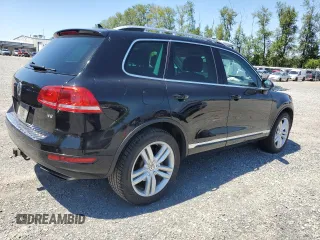 2013 Volkswagen Touareg Lux with VIN WVGEF9BP0DD001565, listed as a Copart auction lot 63070845 with 123,788 mi miles and Salvage title. Bid and sale history available at DreamBid. Image 3.