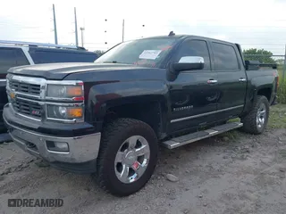 2014 Chevrolet Silverado 1500 LTZ with VIN 3GCUKSECXEG229900, listed as a IAAI auction lot 41962785 with 156,984 mi miles. Bid and sale history available at carsss.com. Image 2.