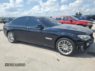 2014 BMW 7 Series 750i xDrive with VIN WBAYB6C53ED225212, listed as a Copart auction lot 71866424 with 122,567 mi miles and Salvage Title. Bid and sale history available at carsss.com. Image 4.
