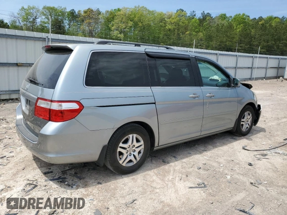 2007 Honda Odyssey EX-L with VIN 5FNRL38657B059033, listed as a Copart auction lot 54005495 with 212,674 mi miles and Salvage Title. Bid and sale history available at DreamBid. Image 3.