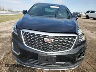 2021 Cadillac XT5 FWD Premium Luxury with VIN 1GYKNCRS1MZ107036, listed as a Copart auction lot 45534075 with 66,813 mi miles and Salvage Title. Bid and sale history available at carsss.com. Image 5.