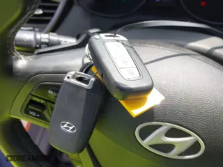 2013 Hyundai Veloster Turbo w/Black Int with VIN KMHTC6AE0DU155675, listed as a IAAI auction lot 41806381 with 81,595 mi miles. Bid and sale history available at carsss.com. Image 11.