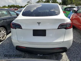 2025 Tesla Model Y Long Range with VIN 7SAYGDED4SF232433, listed as a Copart auction lot 51504015 with Not Provided miles and Salvage Title. Bid and sale history available at DreamBid. Image 6.