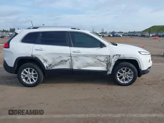 2016 Jeep Cherokee Latitude with VIN 1C4PJMCS1GW185442, listed as a IAAI auction lot 42033699 with 123,306 mi miles. Bid and sale history available at carsss.com. Image 6.