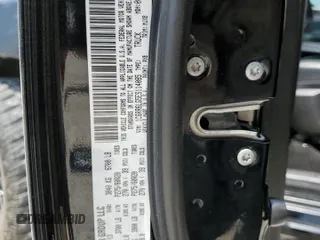2014 Ram 1500 Lone Star z VIN 1C6RR6LG5ES114085, wystawiony jako Copart lot #66417334 z przebiegiem 168 847 mil mil oraz Szkoda całkowita • Salvage title. Historia ofert i sprzedaży dostępna na DreamBid. Obrazek 14.