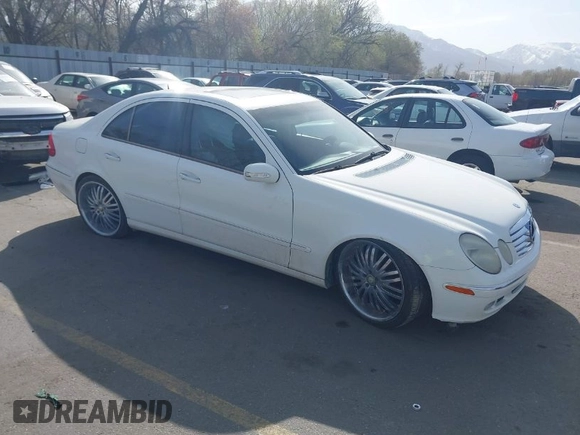 2003 Mercedes-Benz E-Class 3.2L with VIN WDBUF65J63A233107, listed as a IAAI auction lot 42004763 with 151,327 mi miles. Bid and sale history available at carsss.com. Image 1.