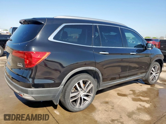 2017 Honda Pilot Elite with VIN 5FNYF6H04HB023609, listed as a Copart auction lot 52235425 with 107,997 mi miles and Salvage Title. Bid and sale history available at DreamBid. Image 3.