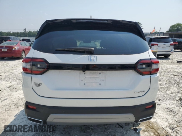 2023 Honda Pilot Touring with VIN 5FNYG2H77PB014212, listed as a Copart auction lot 59222715 with 4,507 mi miles and Salvage title. Bid and sale history available at DreamBid. Image 6.