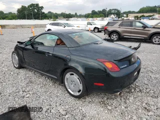 2002 Lexus SC 430 with VIN JTHFN48Y920006524, listed as a Copart auction lot 64680695 with 166,118 mi miles and Salvage title. Bid and sale history available at DreamBid. Image 2.