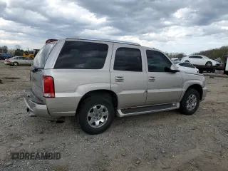 2004 Cadillac Escalade z VIN 1GYEK63N04R309148, wystawiony jako Copart lot #51259085 z przebiegiem 106 646 mil mil oraz Czysty tytuł • Clean title. Historia ofert i sprzedaży dostępna na DreamBid. Obrazek 3.