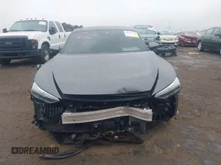 2024 Audi e-tron GT Premium Plus z VIN WAUFJBFW0R7000208, wystawiony jako IAAI lot #40787476 z przebiegiem 7 765 mil mil oraz . Historia ofert i sprzedaży dostępna na DreamBid. Obrazek 13.