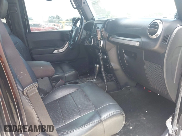 2012 Jeep Wrangler Unlimited Altitude with VIN 1C4HJWEG5CL161049, listed as a IAAI auction lot 42629330 with 217,147 mi miles and . Bid and sale history available at DreamBid. Image 5.