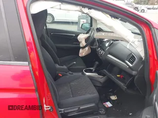 2015 Honda Fit LX with VIN 3HGGK5H5XFM775385, listed as a IAAI auction lot 42555319 with 81,615 mi miles and . Bid and sale history available at DreamBid. Image 5.