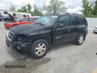2004 GMC Envoy SLT z VIN 1GKDT13S542139812, wystawiony jako Copart lot #54933945 z przebiegiem 175 554 mil mil oraz Szkoda całkowita • Salvage title. Historia ofert i sprzedaży dostępna na DreamBid. Obrazek 1.