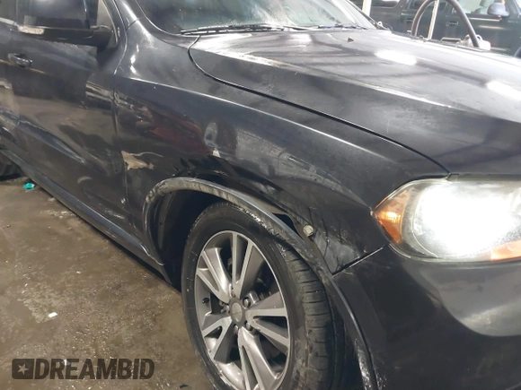 2013 Dodge Durango R/T z VIN 1C4SDJCT2DC662269, wystawiony jako IAAI lot #41602661 z przebiegiem 180 014 mil mil oraz . Historia ofert i sprzedaży dostępna na DreamBid. Obrazek 6.