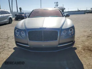 2014 Bentley Flying Spur z VIN SCBEC9ZA7EC090575, wystawiony jako Copart lot #57110315 z przebiegiem 19 083 mil mil oraz Szkoda całkowita • Salvage title. Historia ofert i sprzedaży dostępna na DreamBid. Obrazek 5.