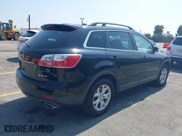 2012 Mazda CX-9 Touring with VIN JM3TB2CV5C0354750, listed as a IAAI auction lot 42181125 with 100,540 mi miles and . Bid and sale history available at carsss.com. Image 4.
