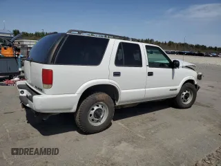 2001 Chevrolet Blazer LS z VIN 1GNDT13W71K230422, wystawiony jako Copart lot #54924005 z przebiegiem 171 035 mil mil oraz Szkoda całkowita • Salvage title. Historia ofert i sprzedaży dostępna na DreamBid. Obrazek 3.