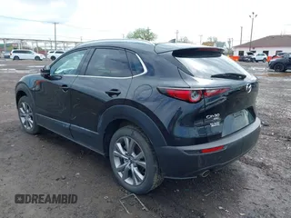2022 Mazda CX-30 S Premium with VIN 3MVDMBDL5NM413878, listed as a IAAI auction lot 42189008 with 46,249 mi miles and . Bid and sale history available at DreamBid. Image 3.