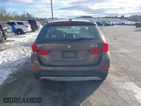 2014 BMW X1 xDrive28i with VIN WBAVL1C56EVY19340, listed as a IAAI auction lot 41340436 with 85,867 mi miles. Bid and sale history available at carsss.com. Image 16.