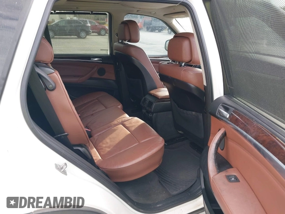 2011 BMW X5 35i with VIN 5UXZV4C54BL412770, listed as a IAAI auction lot 41618946 with 148,612 mi miles. Bid and sale history available at carsss.com. Image 8.