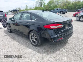 2020 Ford Fusion SEL z VIN 3FA6P0CD5LR131097, wystawiony jako IAAI lot #42218517 z przebiegiem 94 394 mil mil oraz . Historia ofert i sprzedaży dostępna na DreamBid. Obrazek 3.