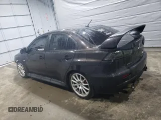 2014 Mitsubishi Lancer Evolution GSR with VIN JA32W8FV5EU017979, listed as a Copart auction lot 47222615 with 109,632 mi miles and Salvage Title. Bid and sale history available at carsss.com. Image 2.