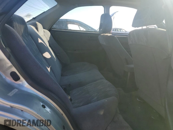 1998 Acura Integra LS with VIN JH4DB7659WS002591, listed as a Copart auction lot 84289584 with 316,458 mi miles and Salvage title. Bid and sale history available at DreamBid. Image 10.