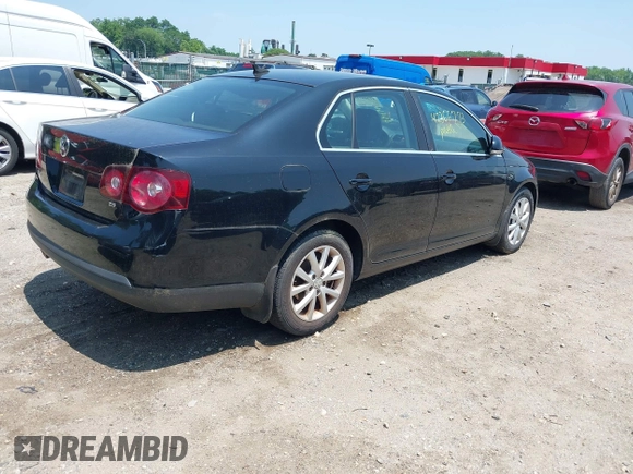 2010 Volkswagen Jetta SE z VIN 3VWRZ7AJ9AM042787, wystawiony jako IAAI lot #42466773 z przebiegiem 144 829 mil mil oraz . Historia ofert i sprzedaży dostępna na DreamBid. Obrazek 4.