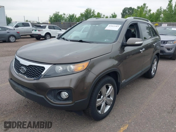 2012 Kia Sorento EX with VIN 5XYKUCA6XCG294104, listed as a IAAI auction lot 42413363 with 57,527 mi miles and . Bid and sale history available at DreamBid. Image 2.