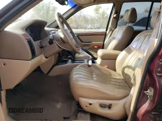 1999 Jeep Grand Cherokee Limited with VIN 1J4GW68S5XC573162, listed as a Copart auction lot 78611274 with 174,960 mi miles and Salvage Title. Bid and sale history available at carsss.com. Image 7.