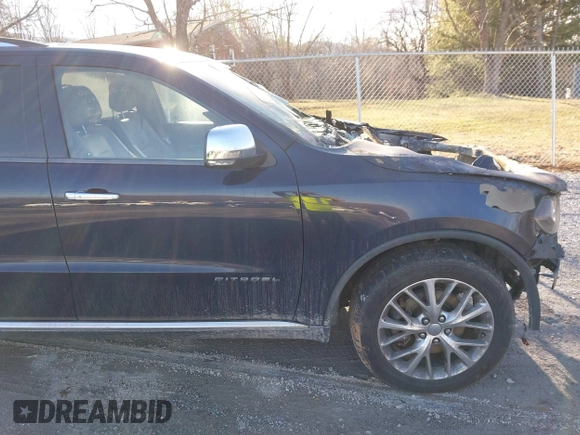 2014 Dodge Durango Citadel with VIN 1C4RDJEG0EC125643, listed as a IAAI auction lot 41461080 with Not Provided miles and . Bid and sale history available at DreamBid. Image 12.