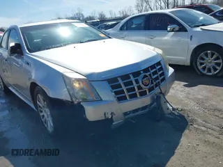 2013 Cadillac CTS Luxury z VIN 1G6DG5E56D0112860, wystawiony jako IAAI lot #41970874 z przebiegiem 125 647 mil mil oraz . Historia ofert i sprzedaży dostępna na DreamBid. Obrazek 6.