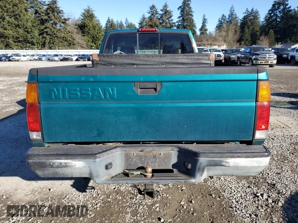 1996 Nissan Frontier XE with VIN 1N6SD16Y9TC338402, listed as a Copart auction lot 45058765 with 164,295 mi miles and Salvage title. Bid and sale history available at DreamBid. Image 6.