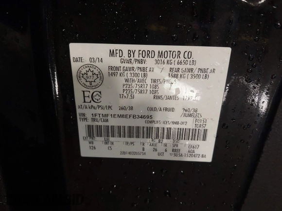 2014 Ford F-150 XL with VIN 1FTMF1EM8EFB34695, listed as a IAAI auction lot 41743020 with 129,749 mi miles. Bid and sale history available at carsss.com. Image 9.