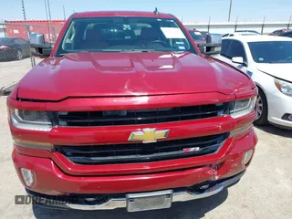 2017 Chevrolet Silverado 1500 LT with VIN 3GCUKREC4HG164281, listed as a IAAI auction lot 42037712 with 133,935 mi miles and . Bid and sale history available at DreamBid. Image 12.