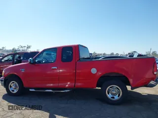2002 Ford F-150 XL with VIN 1FTRX17W52NA81828, listed as a IAAI auction lot 41450811 with 201,948 mi miles. Bid and sale history available at carsss.com. Image 14.