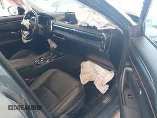 2023 Mazda CX-50 Premium Plus with VIN 7MMVABEY8PN100311, listed as a IAAI auction lot 42626276 with 40,242 mi miles and . Bid and sale history available at DreamBid. Image 5.