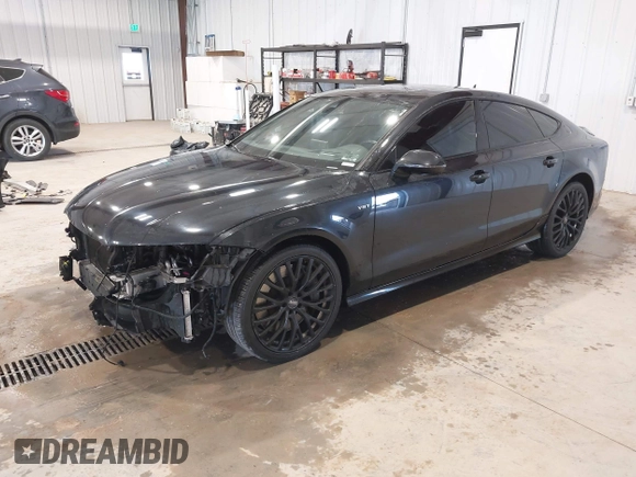2015 Audi S7 with VIN WAUW2AFC0FN015327, listed as a IAAI auction lot 41964788 with 145,953 mi miles. Bid and sale history available at carsss.com. Image 2.