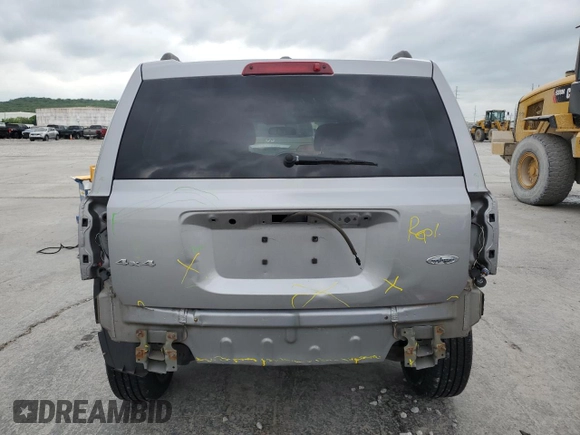 2016 Jeep Patriot Latitude with VIN 1C4NJRFB0GD522016, listed as a Copart auction lot 54688695 with 104,587 mi miles and Salvage title. Bid and sale history available at DreamBid. Image 6.