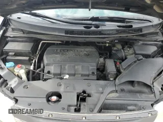 2013 Honda Odyssey EX z VIN 5FNRL5H40DB033400, wystawiony jako Copart lot #50552155 z przebiegiem 223 770 mil mil oraz Nie do naprawy. Historia ofert i sprzedaży dostępna na DreamBid. Obrazek 12.
