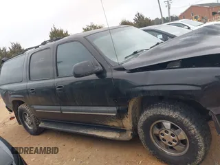2002 Chevrolet Suburban LS with VIN 3GNEC16Z42G281945, listed as a IAAI auction lot 41419037 with 203,928 mi miles. Bid and sale history available at carsss.com. Image 14.