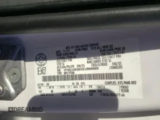 2014 Ford Escape SE z VIN 1FMCU9G9XEUB66869, wystawiony jako Copart lot #59546115 z przebiegiem 224 021 mil mil oraz Szkoda całkowita • Salvage title. Historia ofert i sprzedaży dostępna na DreamBid. Obrazek 13.