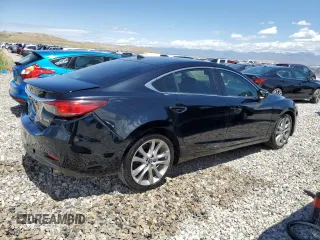2014 Mazda 6 i Grand Touring с VIN JM1GJ1W61E1146244, выставлен на аукционе Copart как лот 57856365 с пробегом 152 194 миль миль и Списание • Salvage title. История ставок и продаж доступна на DreamBid. Изображение 3.