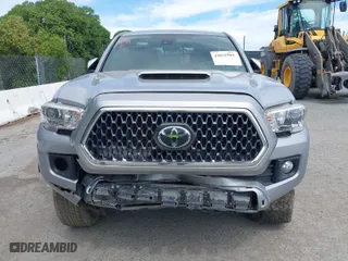 2019 Toyota Tacoma 4WD SR with VIN 3TMCZ5AN4KM194526, listed as a IAAI auction lot 42021504 with 87,767 mi miles. Bid and sale history available at carsss.com. Image 12.